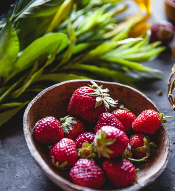 delicious-strawberries-with-yellow-flowers-on-a-gr-2024-11-25-11-44-55-utc-min